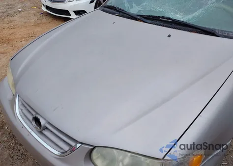 2002 Toyota Corolla Le из США, поврежденный, VIN 1NXBR12E42Z641401